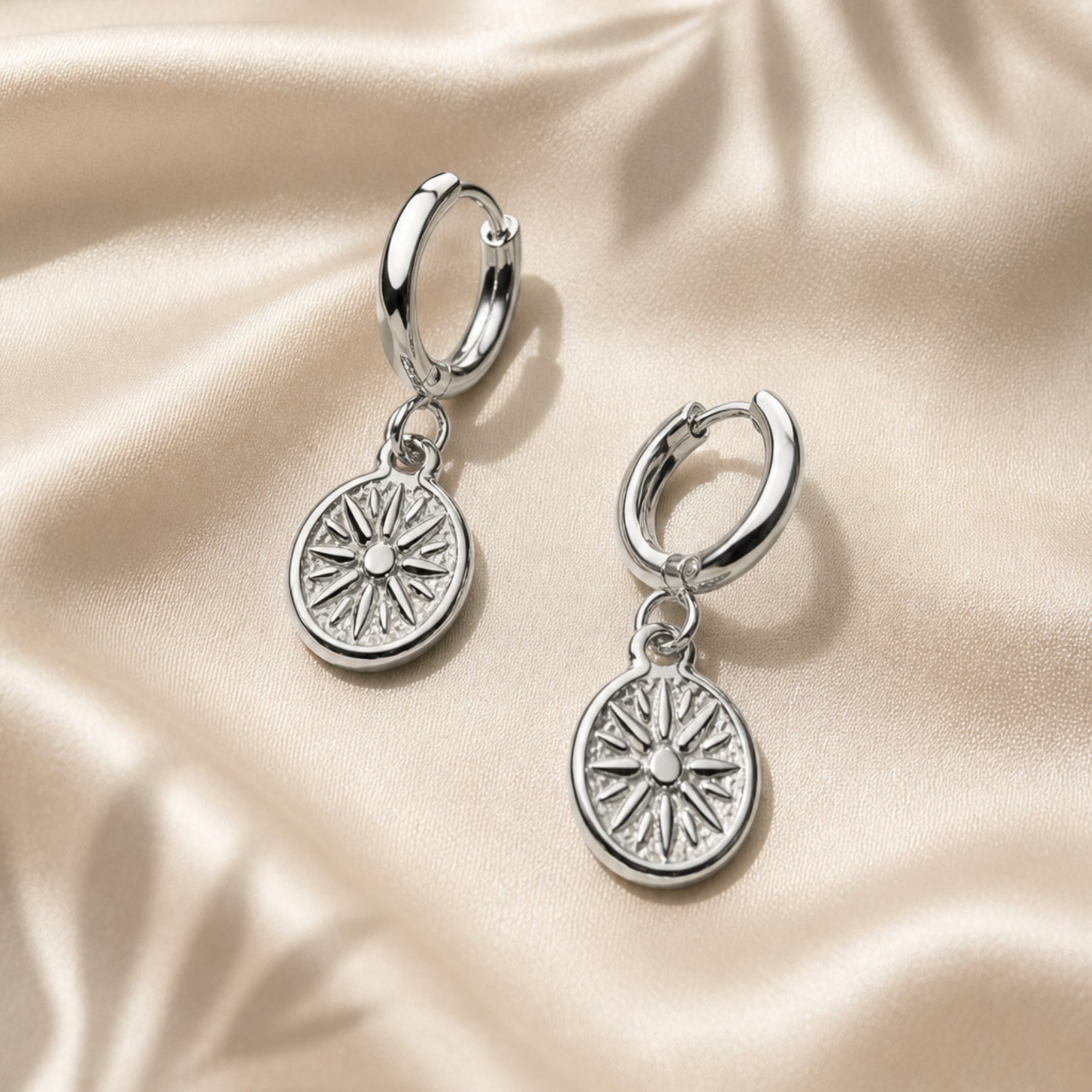 Boucles d'oreilles solaires dorées