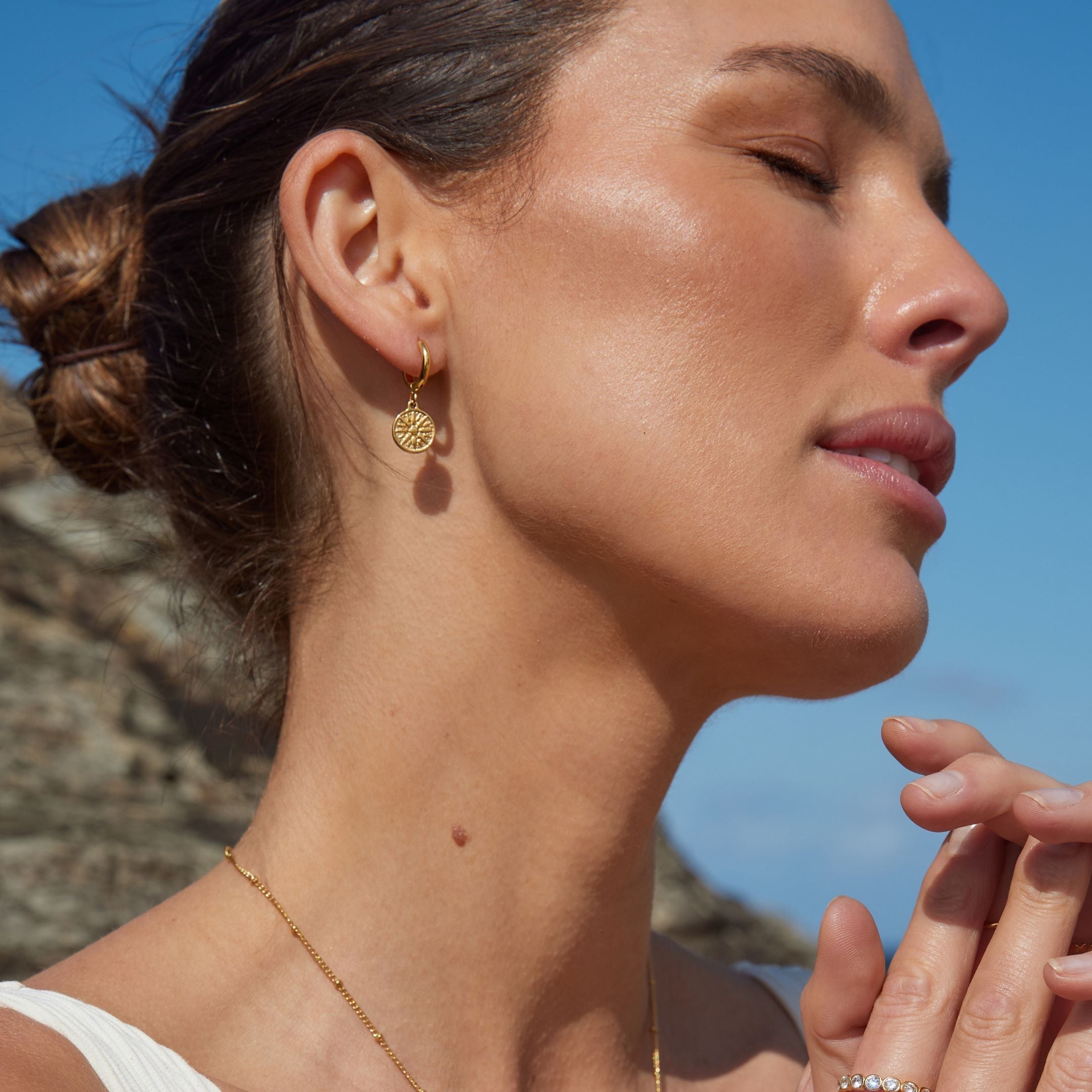 Boucles d'oreilles solaires dorées