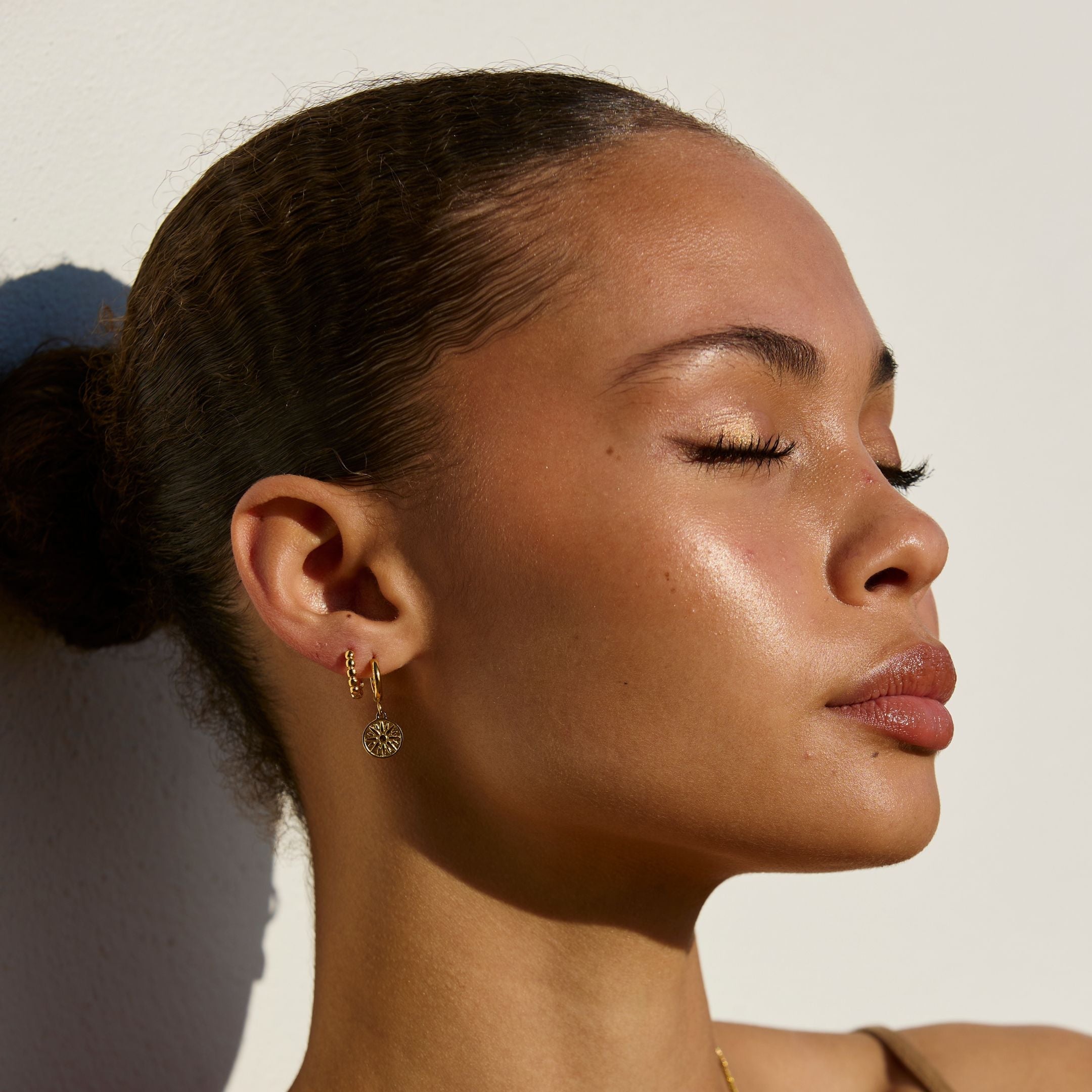 Boucles d'oreilles solaires dorées