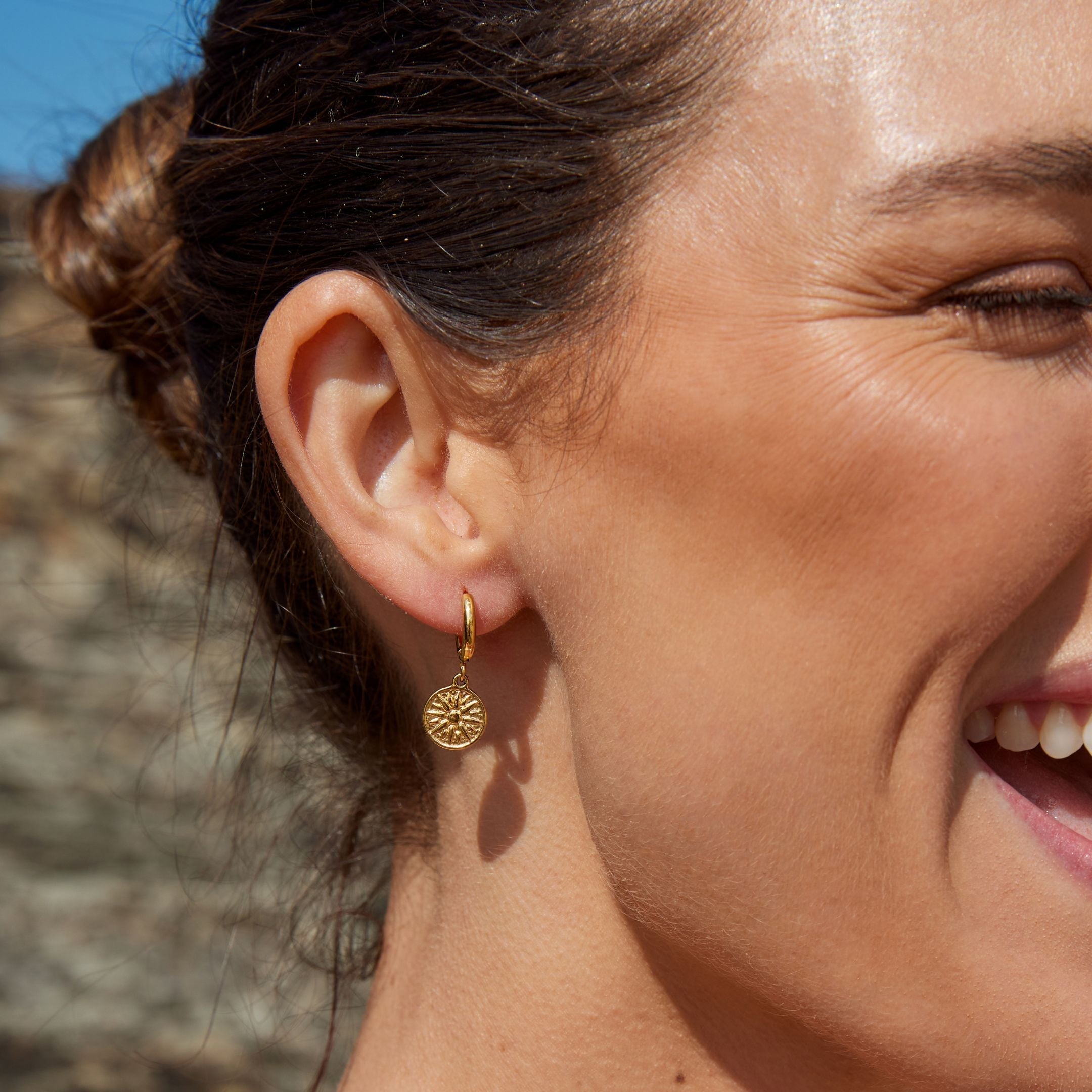 Boucles d'oreilles solaires dorées