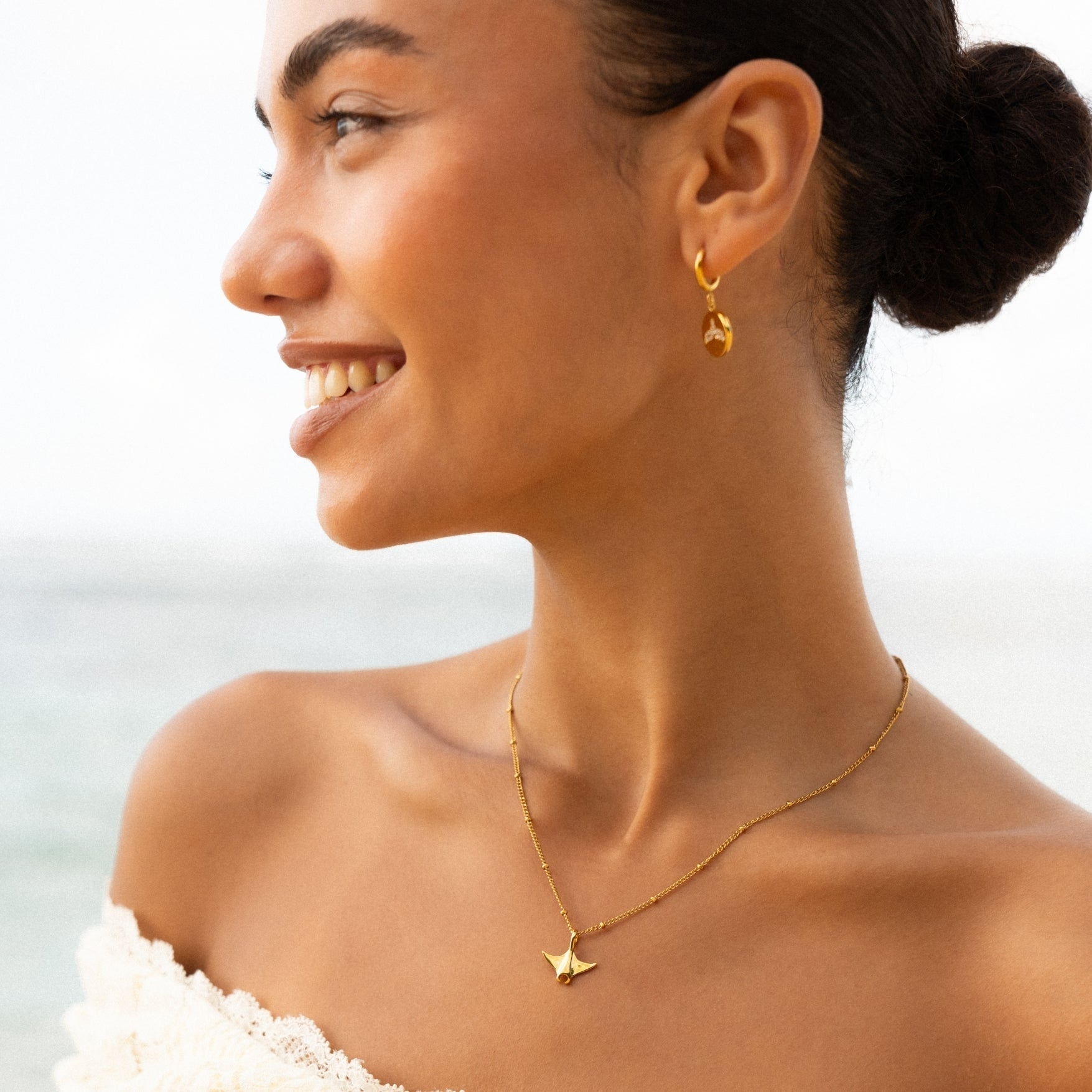 Boucles d'oreilles en forme de nageoire de baleine