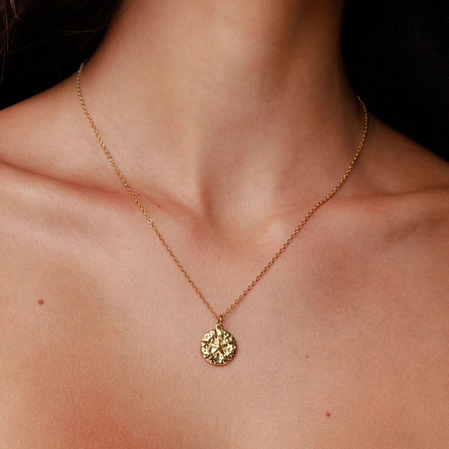 Collier en dollar de sable
