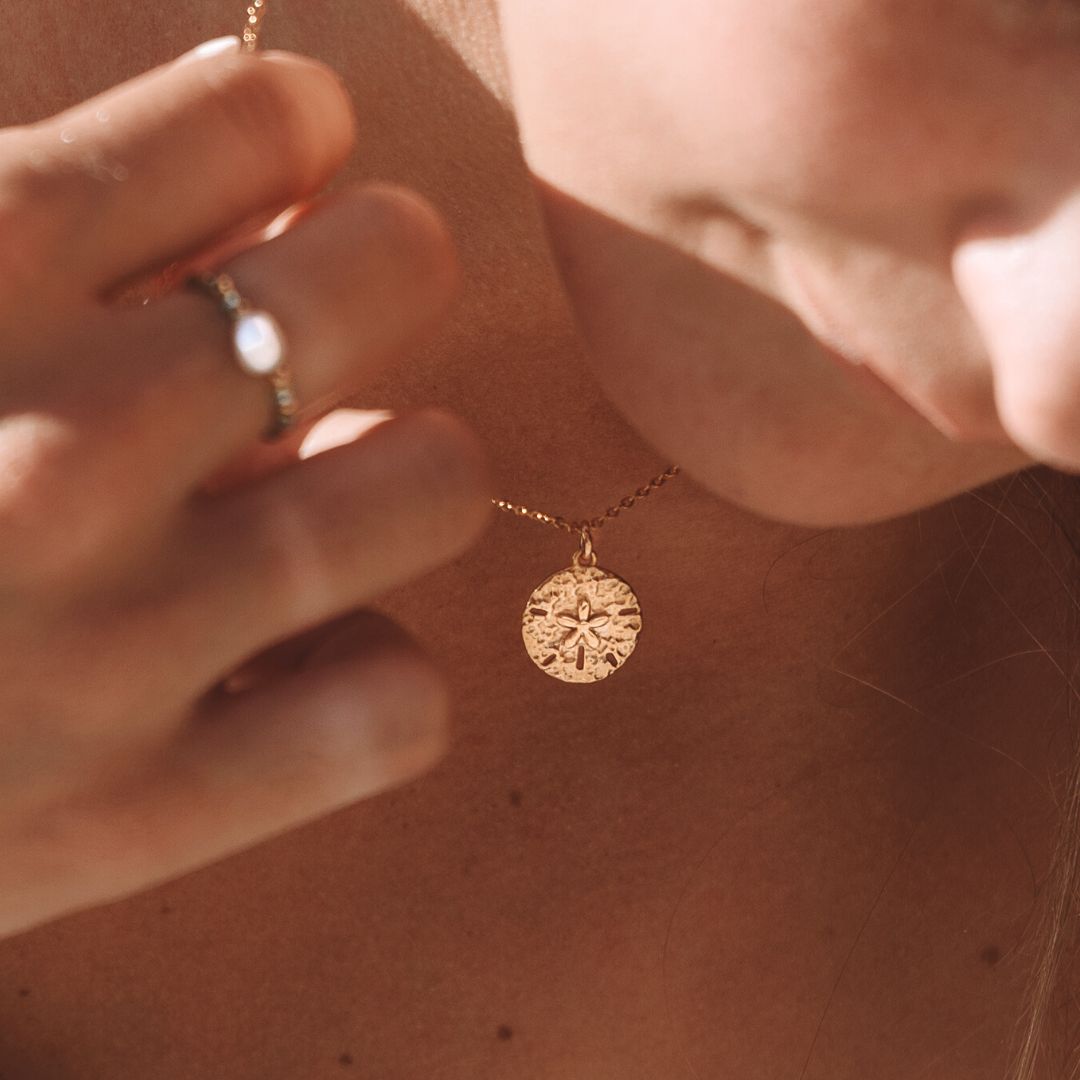 Collier en dollar de sable