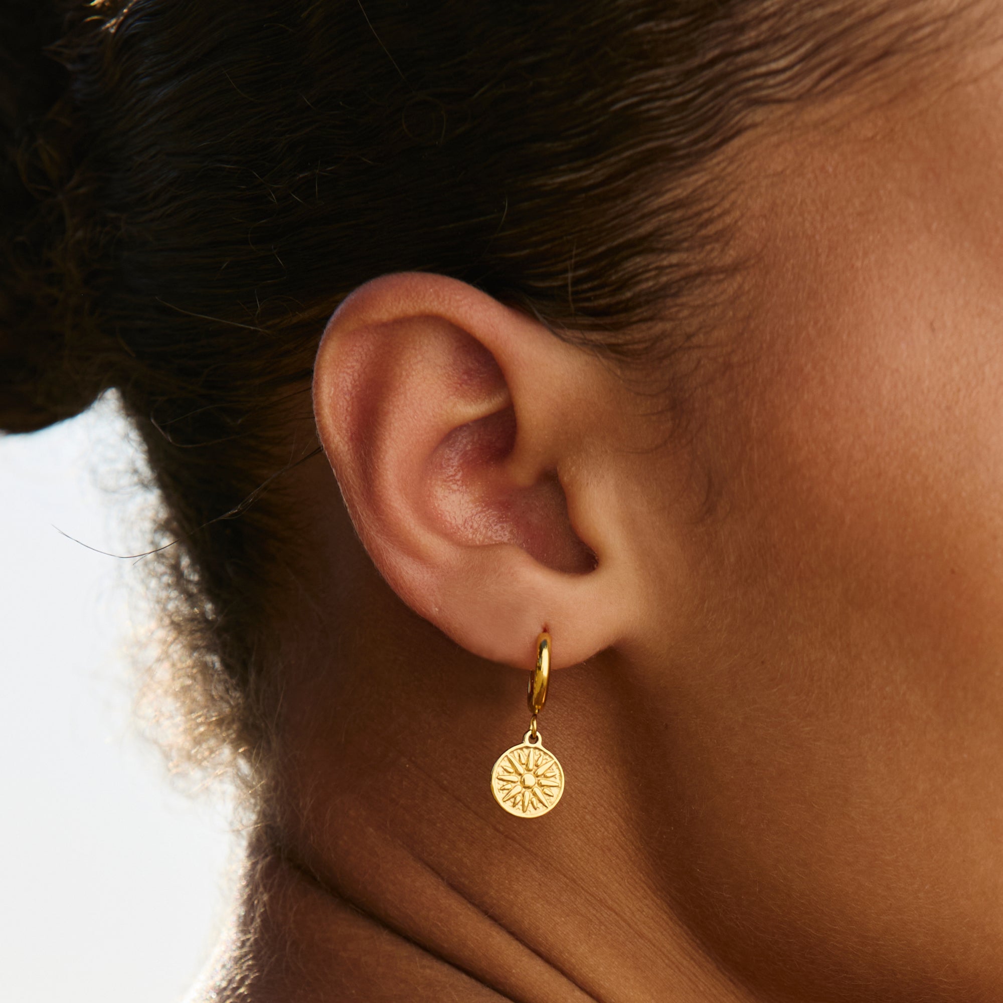 Boucles d'oreilles solaires dorées